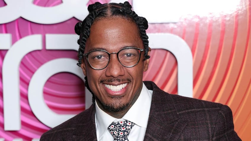 nick cannon reveals he probably spends 200000 a year taking his 12 children to disneyland