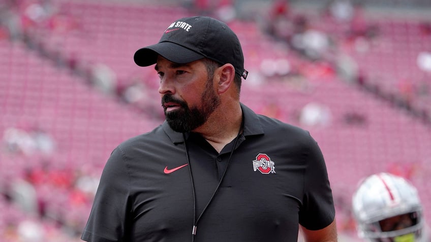 Ryan Day looks on field