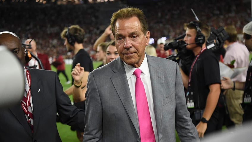 Nick Saban walks off the field after it was renamed in his honor at Bryant-Denny Stadium during halftime of Alabama’s win over South Florida.