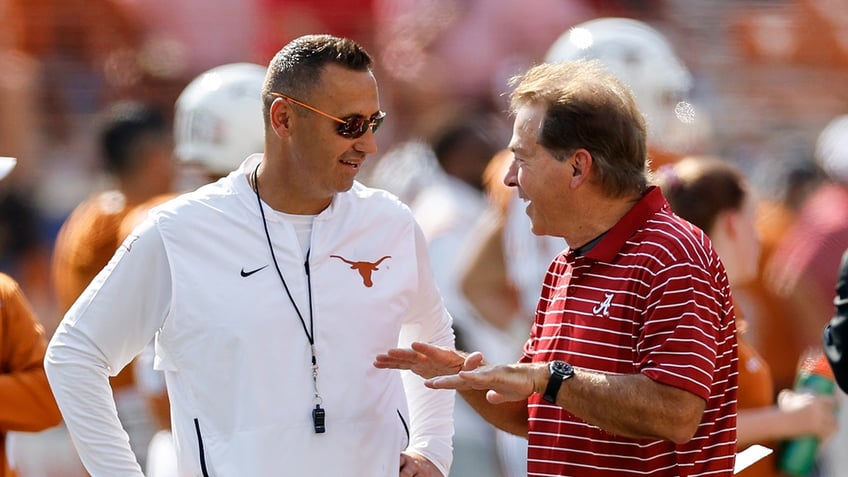 Steve Sarkisian and Nick Saban talk