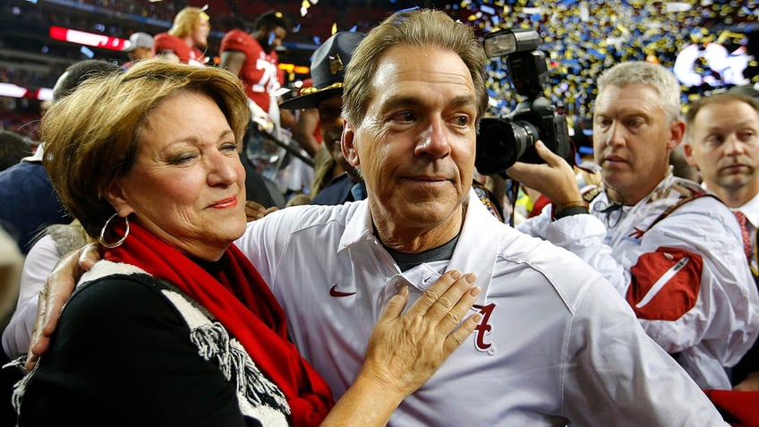 Nick and Terry Saban celebrate