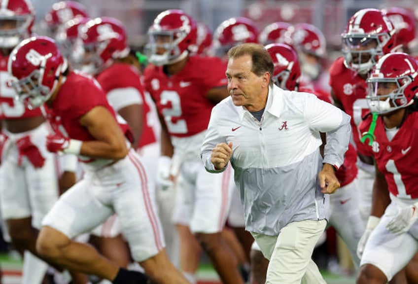 Head coach Nick Saban of the Alabama Crimson Tide leads the team onto the field prior to facing the Texas A&M Aggies at Bryant-Denny Stadium on...