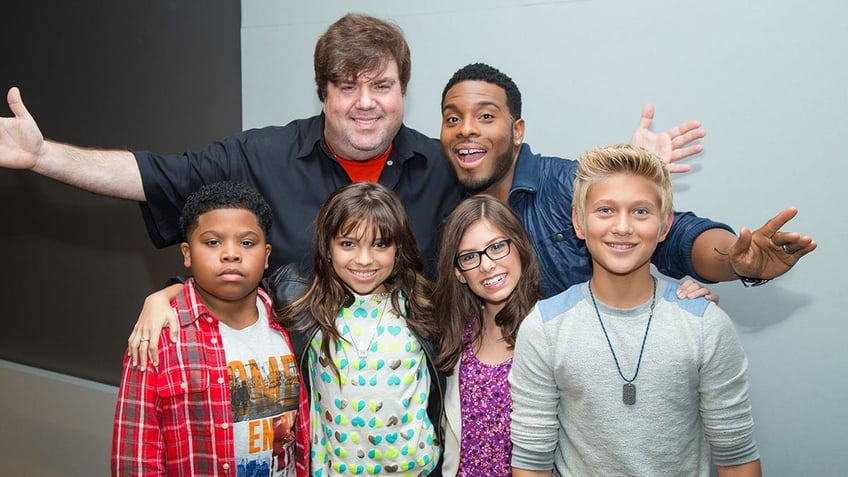 Dan Schenider and Kel Mitchell with children