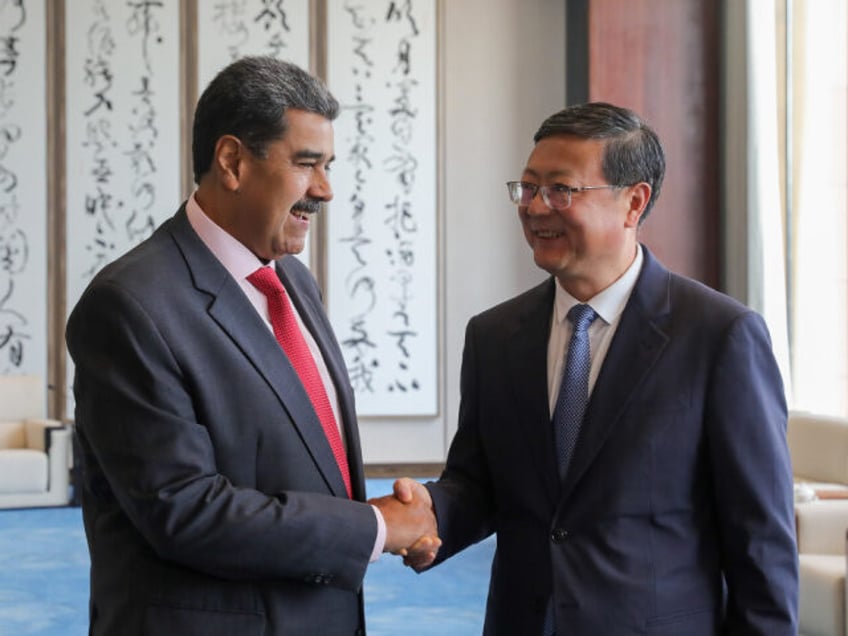 nicolas maduro visits china to seek financial aid and support to join brics