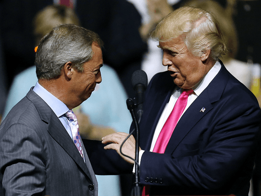 JACKSON, MS - AUGUST 24: Republican Presidential nominee Donald Trump, right, greets United Kingdom Independence Party leader Nigel Farage during a campaign rally at the Mississippi Coliseum on August 24, 2016 in Jackson, Mississippi. Thousands attended to listen to Trump's address in the traditionally conservative state of Mississippi. (Photo by Jonathan Bachman/Getty Images)