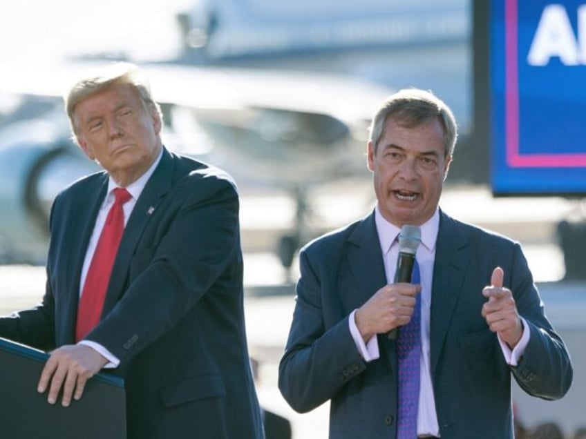 US President Donald Trump listens as Nigel Farage (R) speaks during a Make America Great A