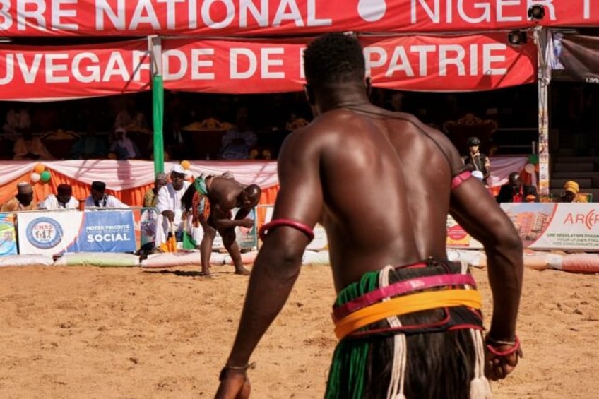 Traditional wrestling was once practised by villagers in Niger at the end of the harvest but is now a hugely popular sport