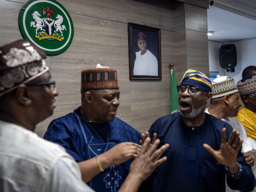 All Progressives Congress (APC) party officials Festus Keyamo, left, Femi Fani-Kayode, cen