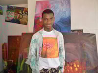 Nigerian teenager sets world painting record with canvas that’s bigger than a soccer field