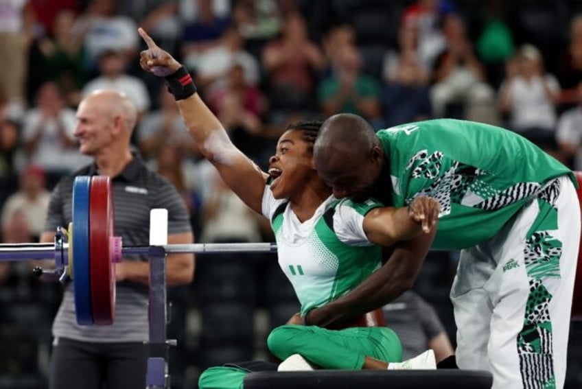 Nigerian Esther Nworgu was overjoyed after winning the silver medal in the women's powerli