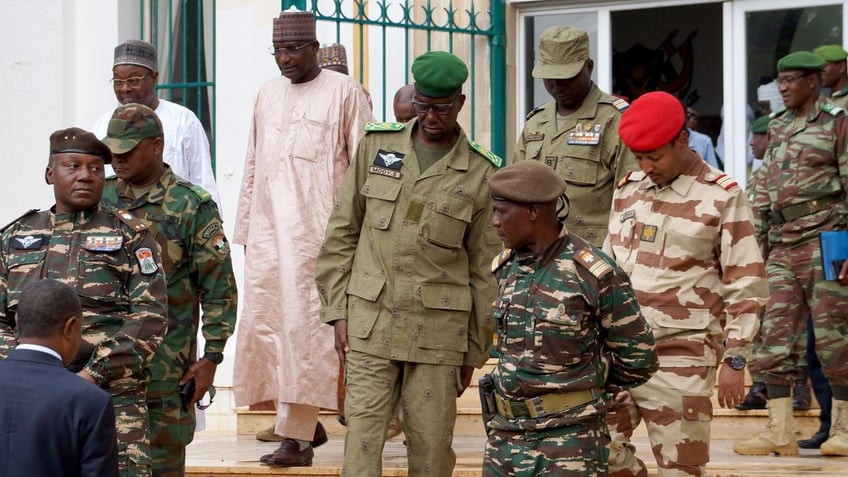 nigers military junta requests sanctions relief from west african court