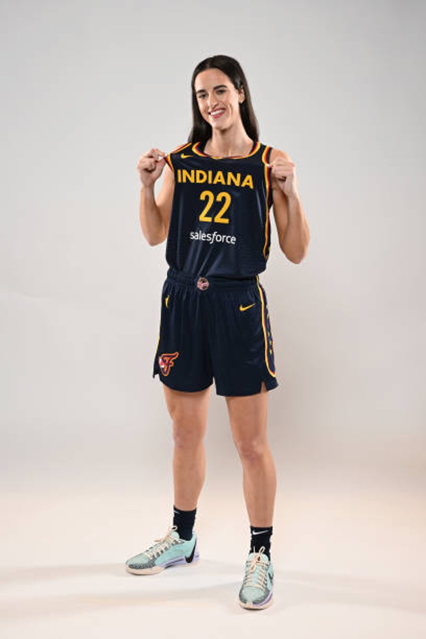 Caitlin Clark of the Indiana Fever poses for a portrait at Gainbridge Fieldhouse during her introductory press conference on April 17, 2024 at...