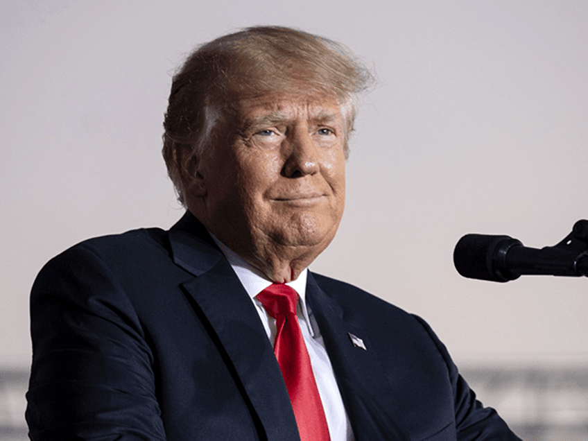 Former President Donald Trump speaks during his Save America rally in Perry, Ga., Sept. 25, 2021. A resurgent GOP is poised to reclaim one, if not both, chambers of Congress and retain its lock on dozens of state legislatures and governor’s offices. The turnaround — which is expected but far from assured — is fueled by an unpopular Joe Biden presidency, deep frustration with the lingering pandemic and fresh concerns about inflation, as well as the GOP having history on its side. (AP Photo/Ben Gray, File)