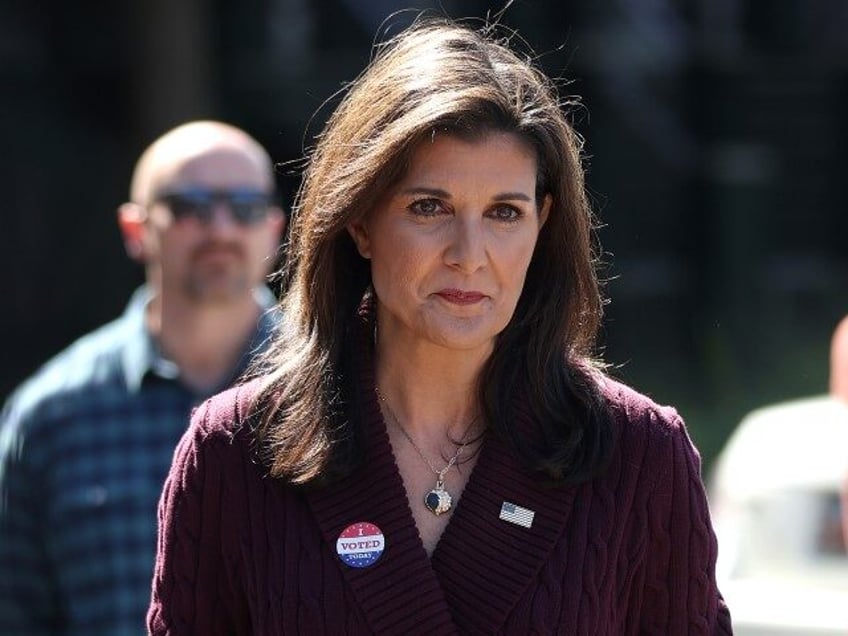 Republican presidential candidate former U.N. Ambassador Nikki Haley speaks to reporters a