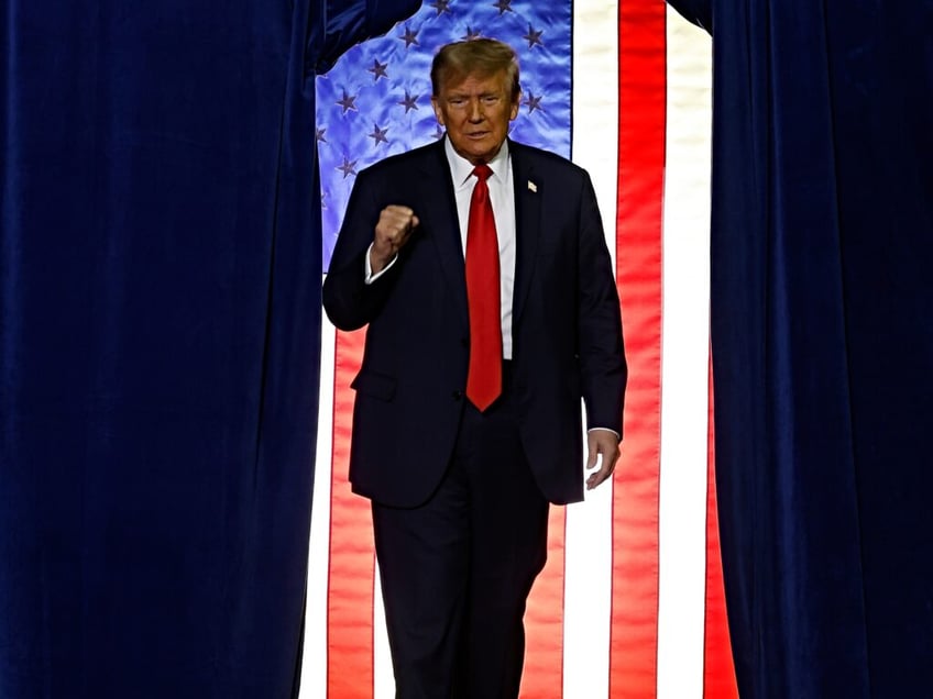 MANCHESTER, NEW HAMPSHIRE - JANUARY 20: Republican presidential candidate and former President Donald Trump takes the stage during a campaign rally at the SNHU Arena on January 20, 2024 in Manchester, New Hampshire. Trump is rallying four days before New Hampshire voters will weigh in on the Republican nominating race with their first-in-the-nation primary. (Photo by Chip Somodevilla/Getty Images)