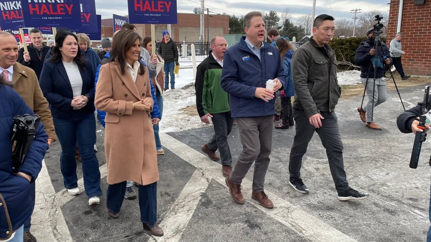 Haley and Sununu at a polling station on primary day in New Hampshire