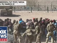 Nine migrants charged with assault, inciting a riot after storming border