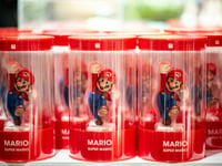 Nintendo lowers sales forecast as first-half profits plunge