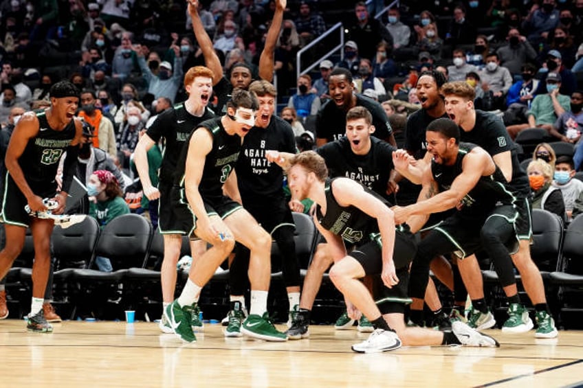 Brendan Barry of the Dartmouth Big Green celebrates a shot in the second half during college basketball game against the Georgetown Hoyas at Capital...