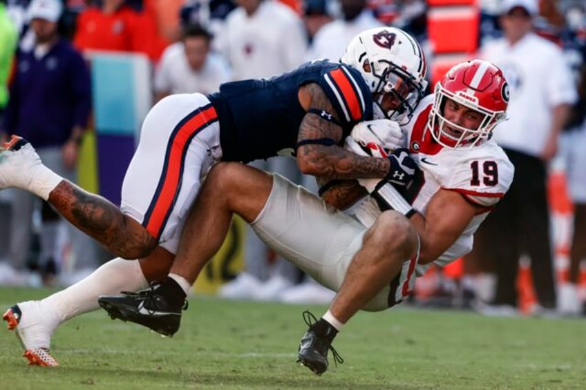 no 1 georgia no 20 kentucky face off for sec east lead no 11 alabama texas am clash out west