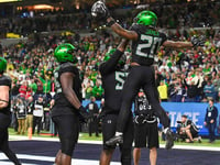 No. 1 Oregon staves off valiant Penn State effort to win Big Ten title