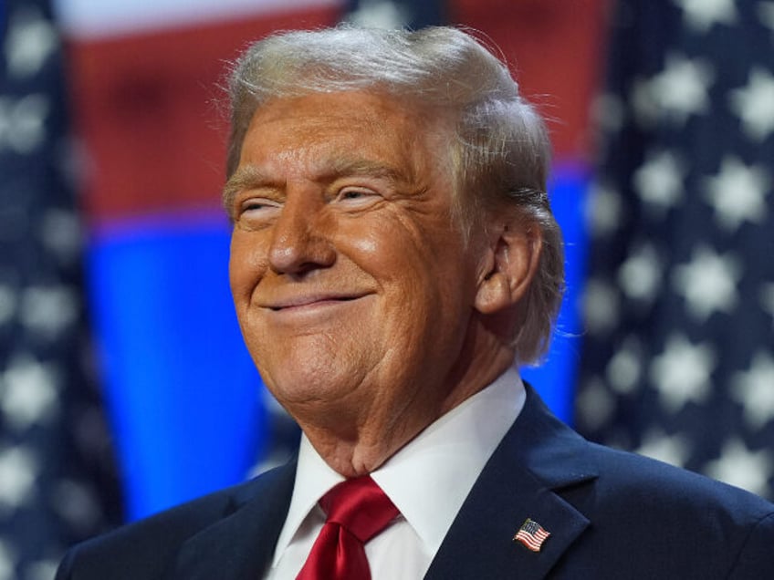 Republican presidential nominee former President Donald Trump smiles at an election night