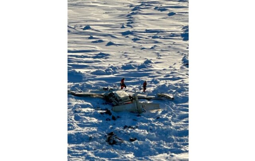 This image from the US Coast Guard shows the wreckage of a Bering Air Caravan plane report