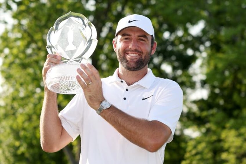 World number one Scottie Scheffler of the United States has lifted three trophies in four