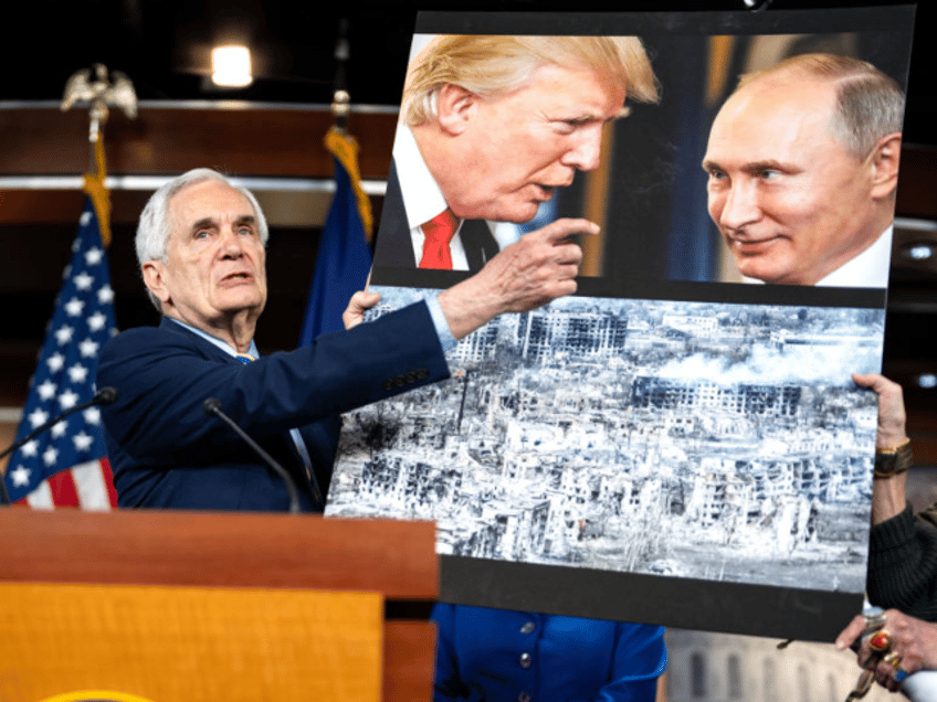 WASHINGTON, DC - FEBRUARY 24: U.S. Rep. Lloyd Doggett (D-TX) points to a photograph of Don
