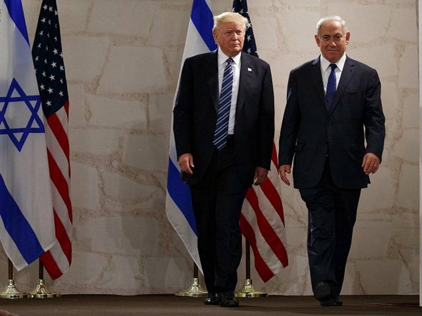 Israeli Prime Minister Benjamin Netanyahu and President Donald Trump arrive for a speech at the Israel Museum, Tuesday, May 23, 2017, in Jerusalem. (AP Photo/Evan Vucci)