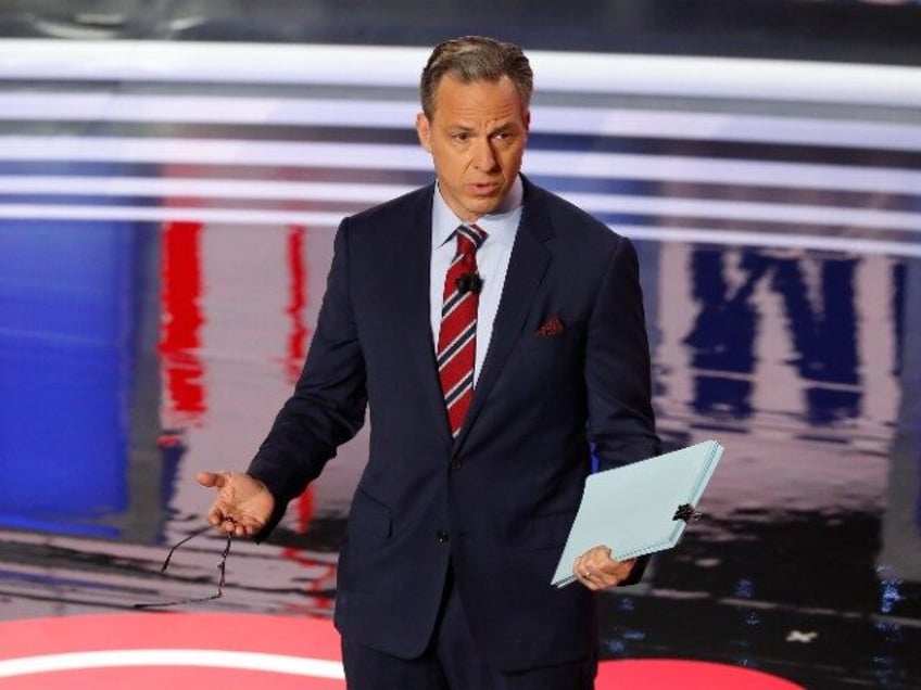 Jake Tapper speaks before the first of two Democratic presidential primary debates hosted