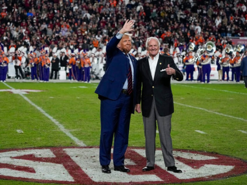 Republican presidential candidate and former President Donald Trump waves with South Carol