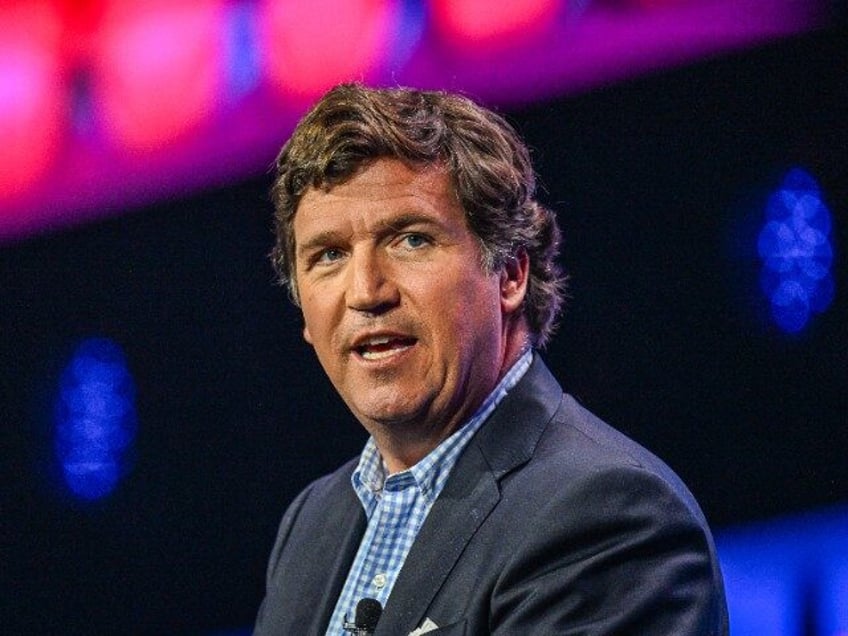 US conservative political commentator Tucker Carlson speaks at the Turning Point Action US