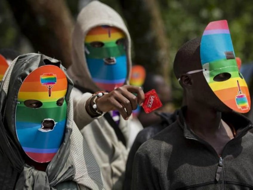 FILE - In this Monday, Feb. 10, 2014 file photo, Kenyan gays and lesbians and others suppo