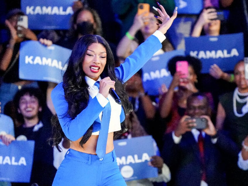 ATLANTA, GEORGIA - JULY 30: Megan Thee Stallion performs onstage at a campaign rally for D