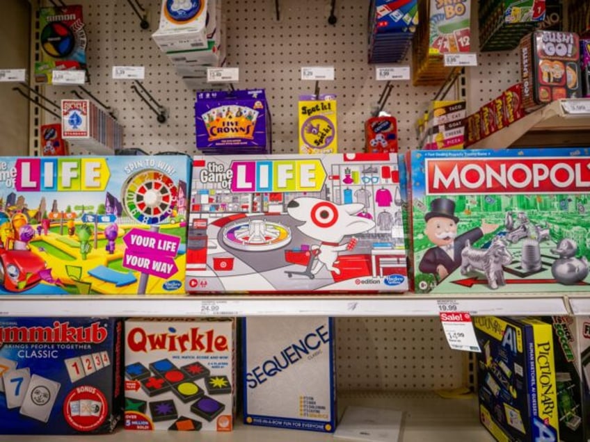 AUSTIN, TEXAS - DECEMBER 12: Hasbro board games are seen for sale at a Target store on December 12, 2023 in Austin, Texas. The multi-billon dollar toy and game company Hasbro is laying off 1,100 employees as ongoing financial constraints and a decline in toy sales continue straining the company. …