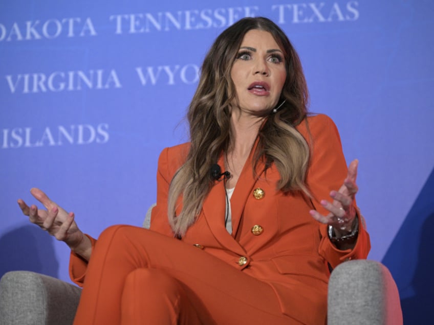 South Dakota Gov. Kristi Noem answers a question while taking part in a panel discussion d