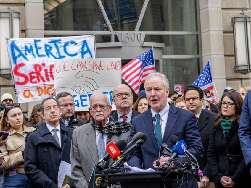 Senator Chris Van Hollen, a Democrat from Maryland, speaks outside the US Agency for Inter