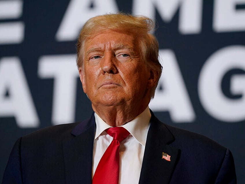 Former President Donald Trump arrives at a rally in Cedar Rapids, Iowa, Saturday, Oct. 7, 2023. A l