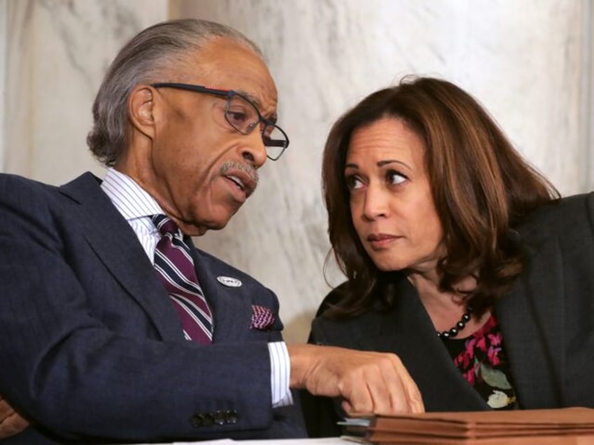 WASHINGTON, DC - NOVEMBER 13: The Rev. Al Sharpton (L) talks with Sen. Kamala Harris (D-CA