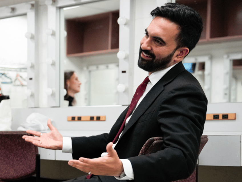 Zohran Mamdani, New York City mayoral candidate, right, prepares for a mayoral Democratic