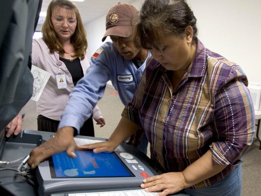 Brazoria County election troubleshooters, from left, Gina Anderson, Courtney Brown and Dor