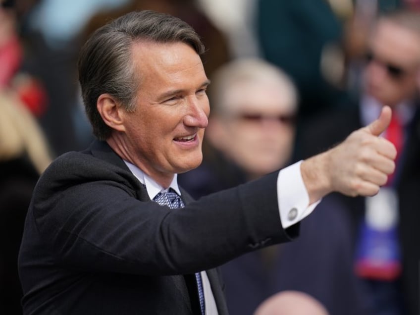 Glenn Youngkin gestures after he was sworn in as Virginia's 74th governor during an inauguration ceremony, Saturday, Jan. 15, 2022, in Richmond, Va.