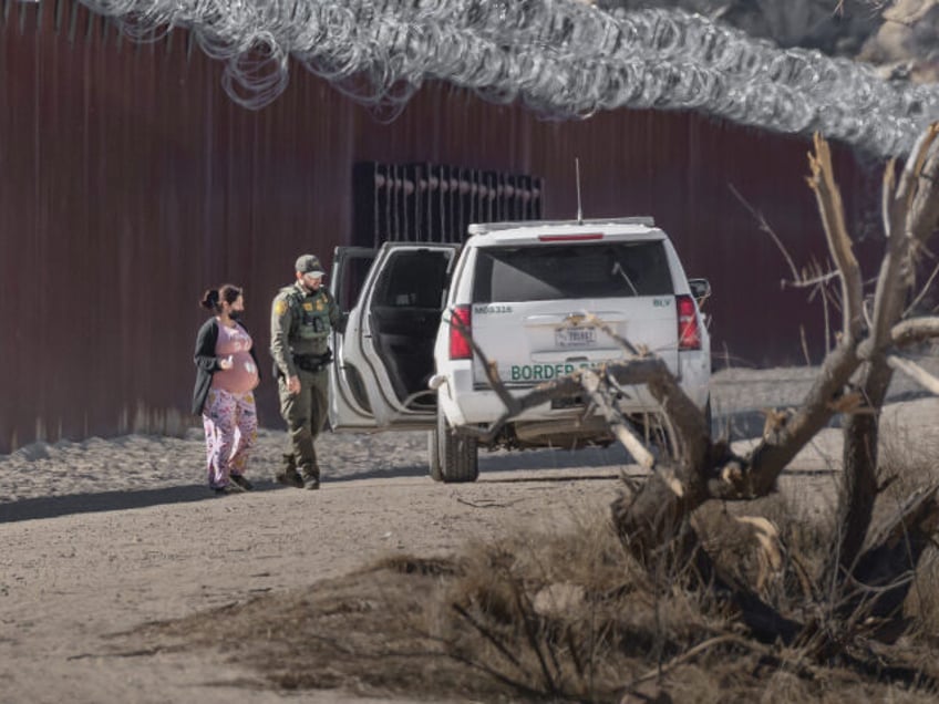 JACUMBA HOT SPRINGS, CALIFORNIA - DECEMBER 13: A pregnant immigrant enters a Border Patrol