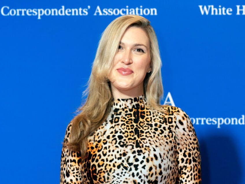 New York magazine’s Washington correspondent Olivia Nuzzi poses for photographers as she