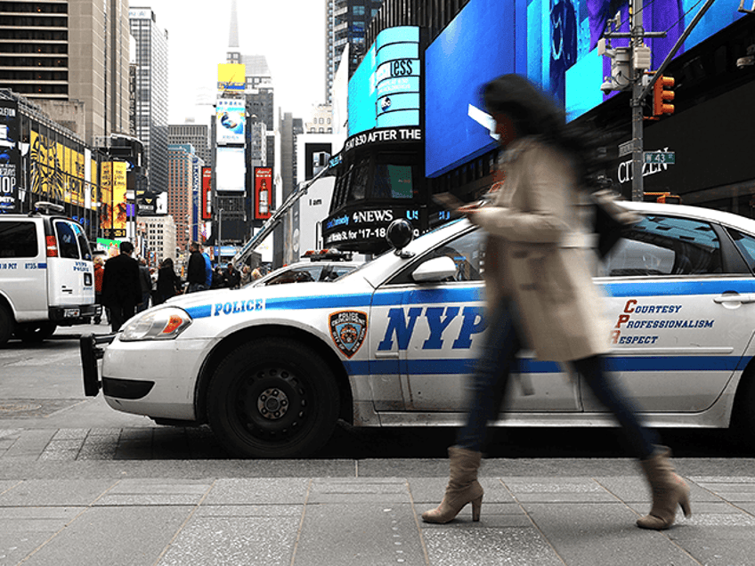 New York City Police keep a presence in Times Square following political developments arou