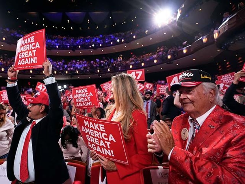 Supporters cheer before Republican presidential nominee former President Donald Trump spea