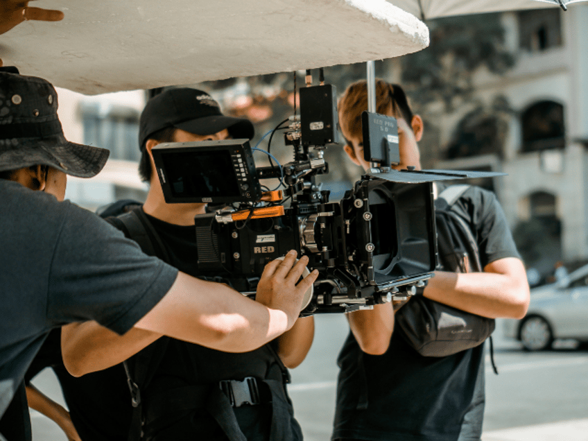 Man Holding Camera