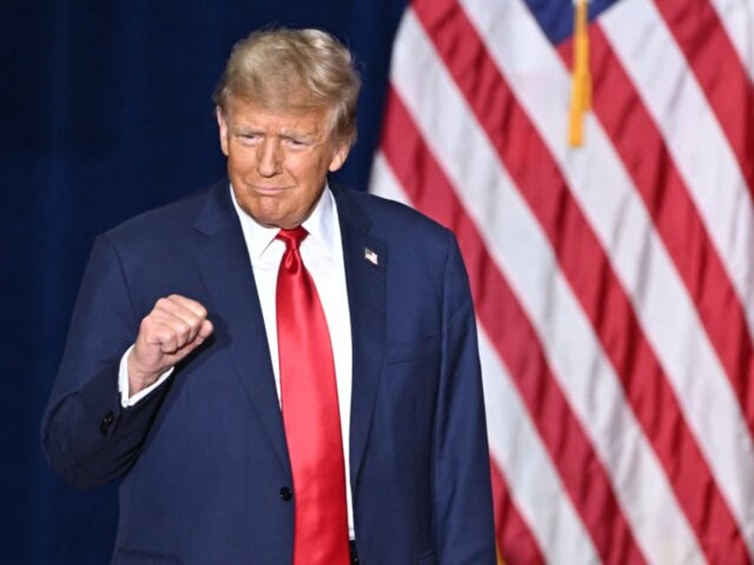 Former US President and Republican presidential hopeful Donald Trump arrives at a watch party during the 2024 Iowa Republican presidential caucuses in Des Moines, Iowa, on January 15, 2024. Trump told Americans Monday "it is time for our country to come together" after he won the Iowa caucuses, cementing his …