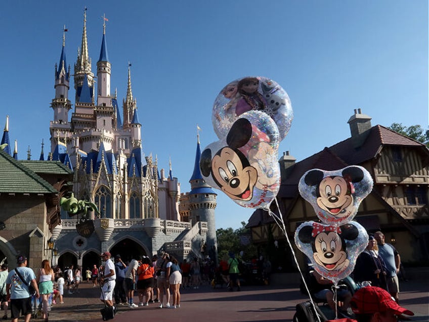 ORLANDO, FL - MAY 31: Mickey Mouse and Minnie Mouse ballons fly in front of Cinderella's C